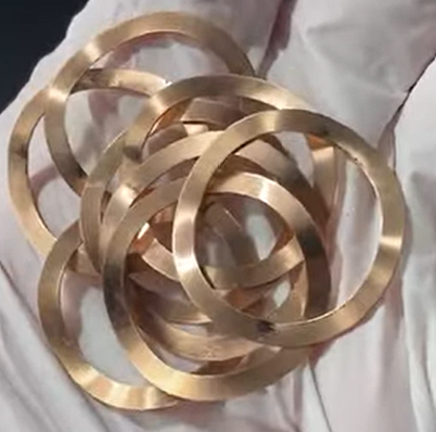 Heat treatment of phosphor bronze springs